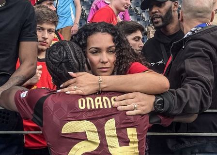 Amadou Onana hugging his wife Melanie Kamayou